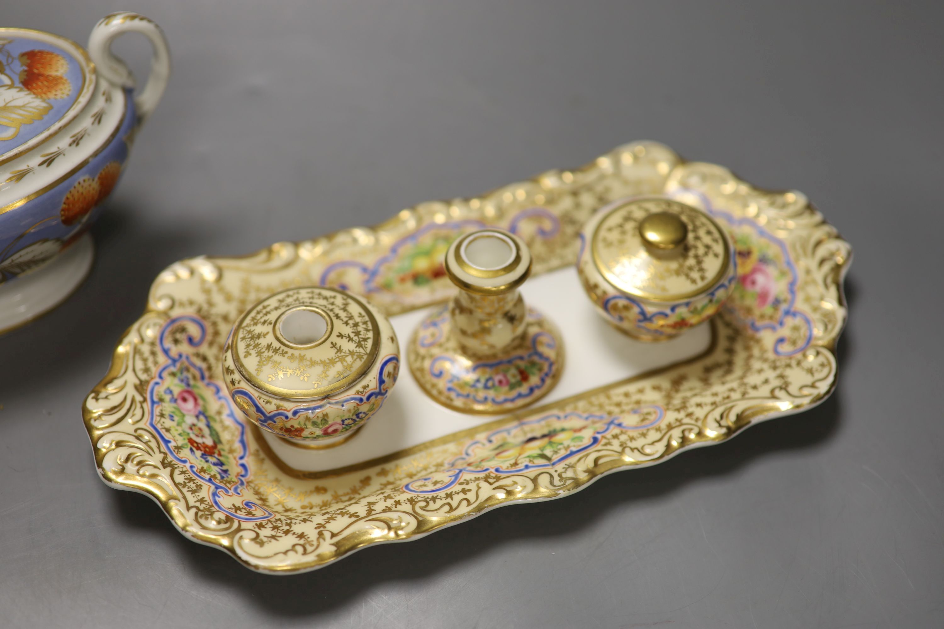 A Copeland and Garrett inkstand with fixed pots and candlestick and two covers,